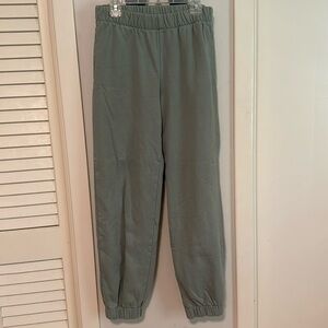 John Galt green sweatpants.